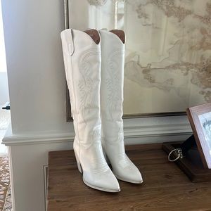Tall white cowboy boots